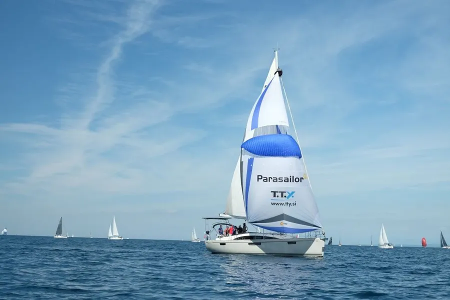 SY Spectrum under her blue Parasailor