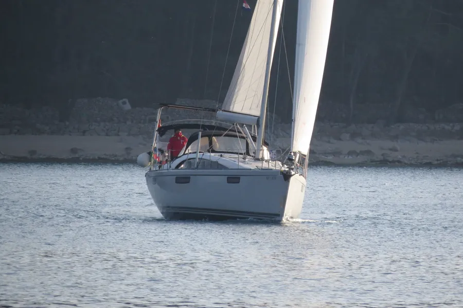 SY Spectrum under white sails
